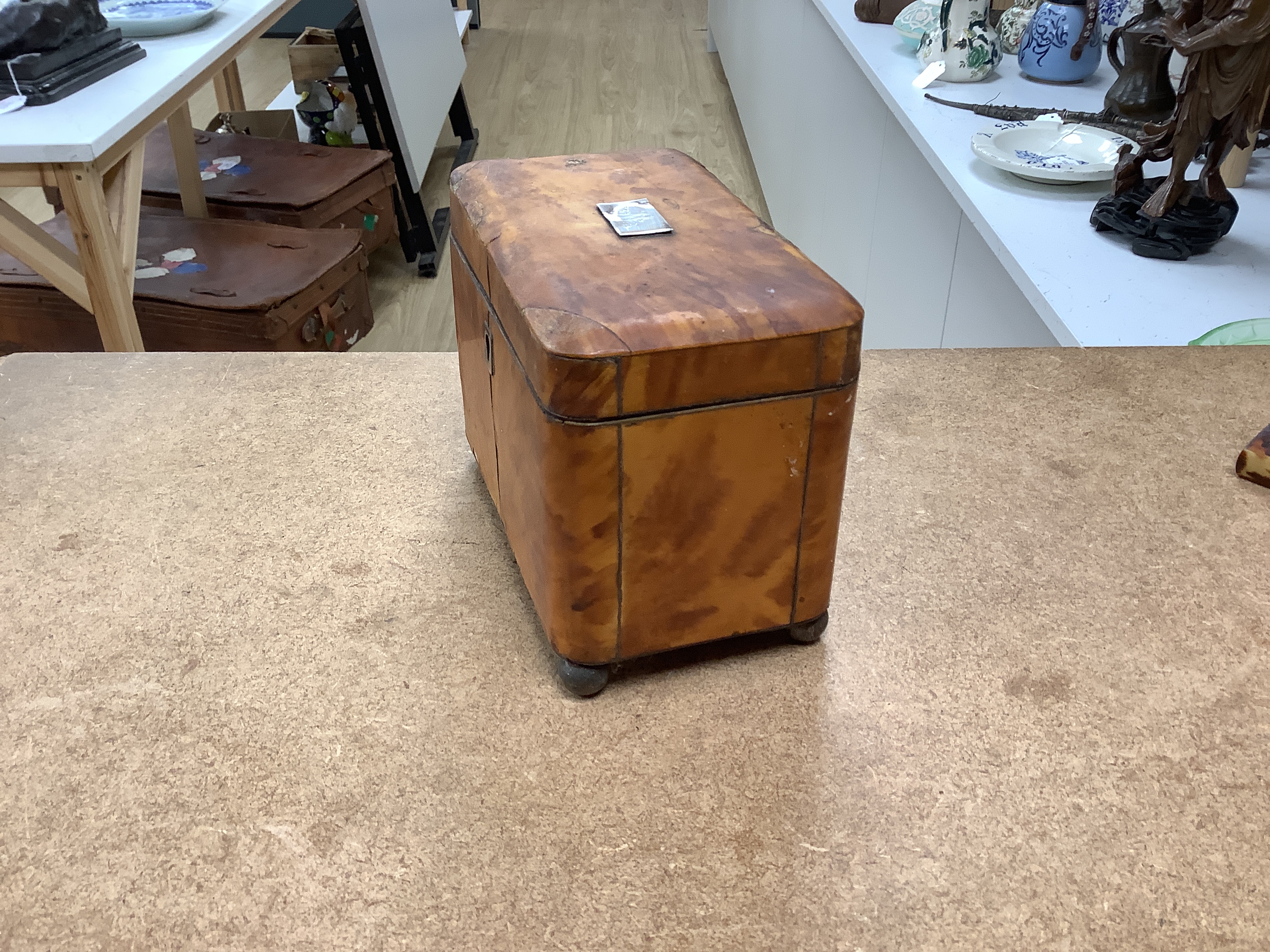 A 19th century two section tortoiseshell tea caddy on ball feet, a tortoiseshell necessaire case and a tortoiseshell and mother of pearl inlaid card case. tea caddy 15cm wide x 11cm high x 9cm deep CITES Submission refer